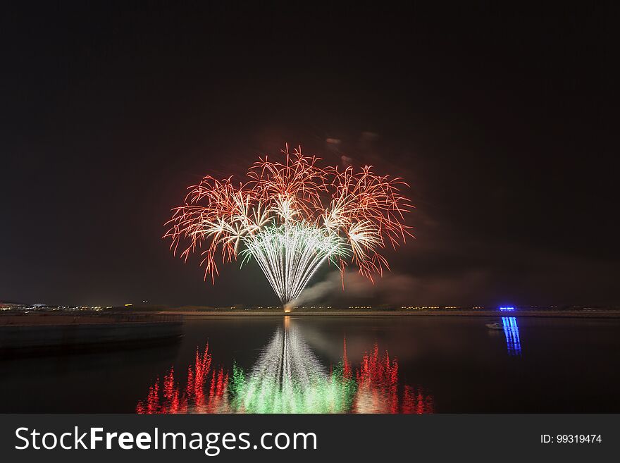 Colourful fireworks exploding over a dark night sky in Abu Dhabi, UAE