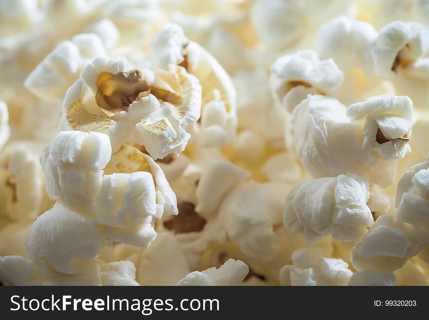 Closeup view on popcorn, unhealthy snack, corn, macro