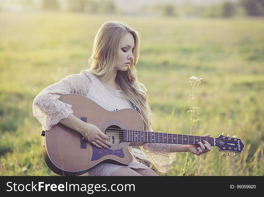 Grass, Human Hair Color, Sitting, Girl