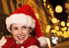 Smiling Woman At Christmas In Florence, Italy Looking Aside Royalty Free Stock Image