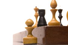 Chessmen On A Chessboard Stock Images