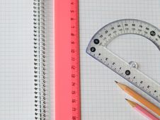 Ruler And Pencils On Copybook Royalty Free Stock Photo