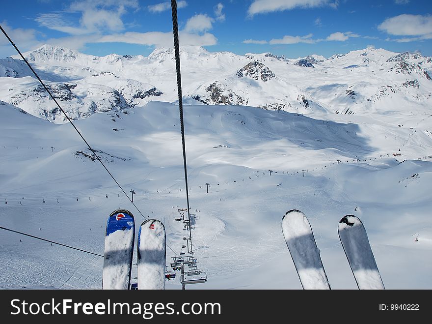 Skier's view from above over the snowy mountains