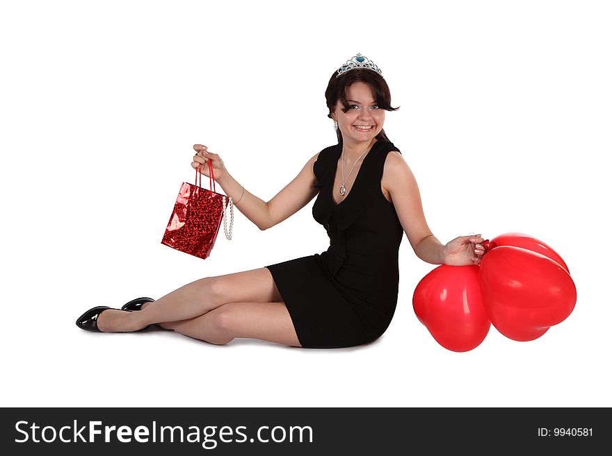 The girl with red balloons and gift. The girl with red balloons and gift