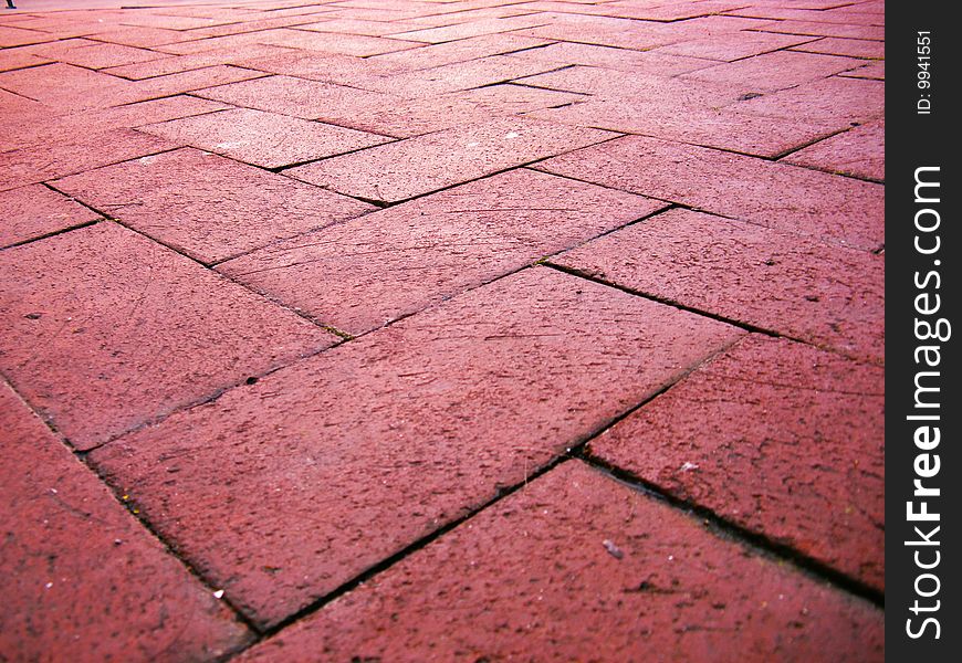 An image of a brick pattern on the ground. An image of a brick pattern on the ground