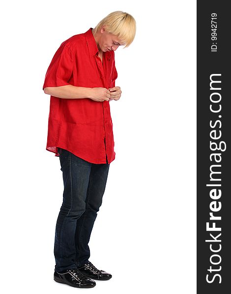 Young blonde man in red shirt posing. Isolated.