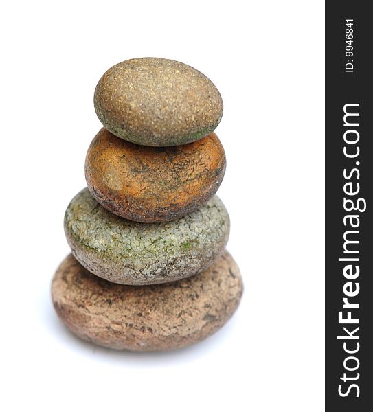 Shot of four pebbles in a pyramid shape. Shot of four pebbles in a pyramid shape