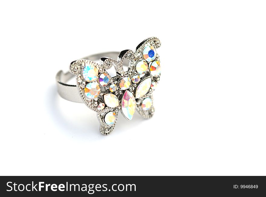 Shot of a pretty butterfly ring on white