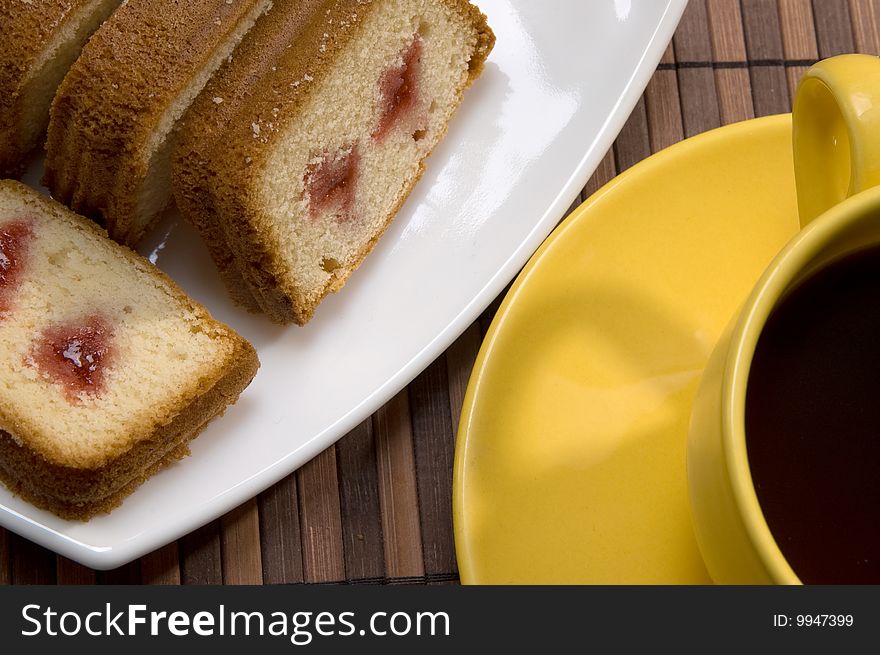 Slice of a sweet pie and tea cup