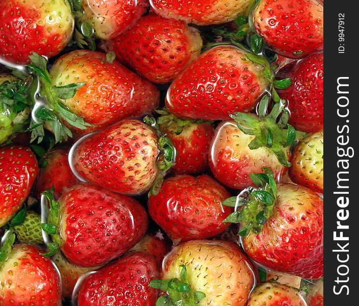 Close-up of strawberries in water. Close-up of strawberries in water