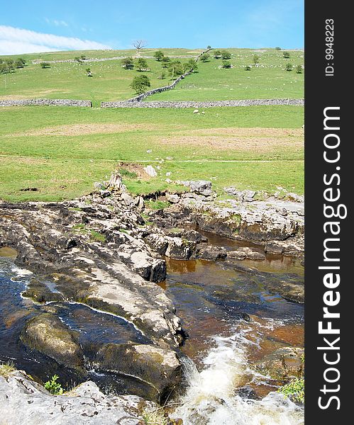 Water flowing over rocks in Yorkshire Dales scenery. Water flowing over rocks in Yorkshire Dales scenery