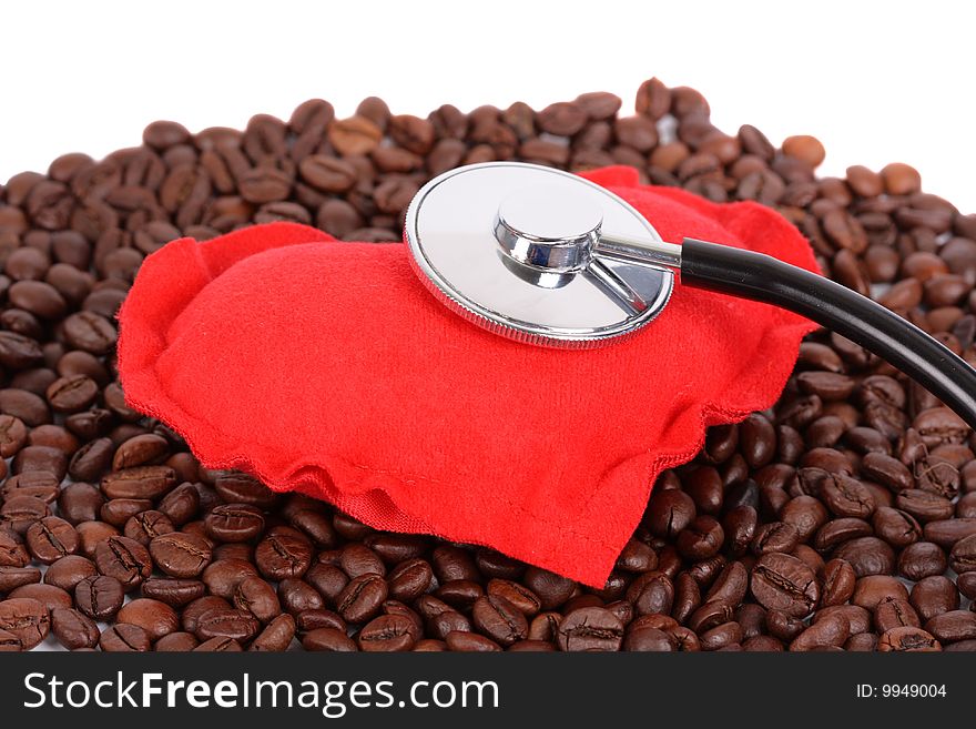 Heart on coffee beans with stethoscope