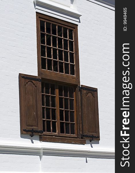 Wooden Shutters On A White Wall