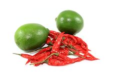Limes And Hot Peppers Royalty Free Stock Image