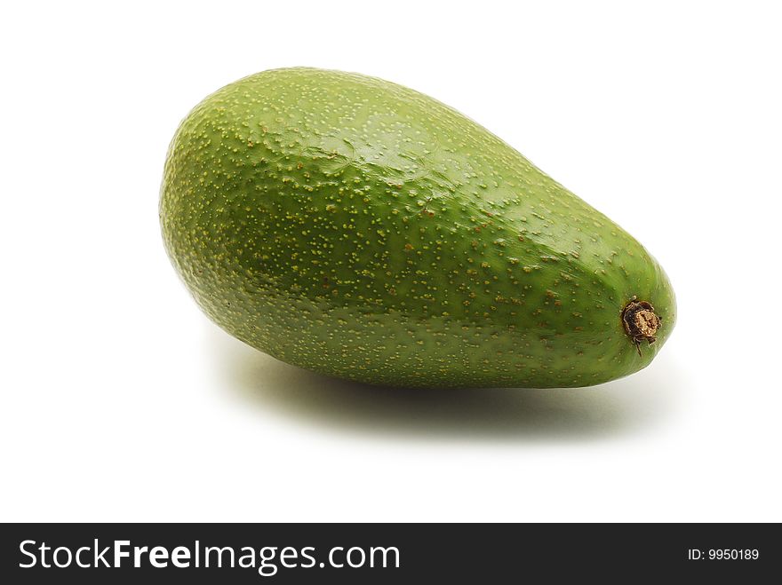 Green avocado isolated on white background