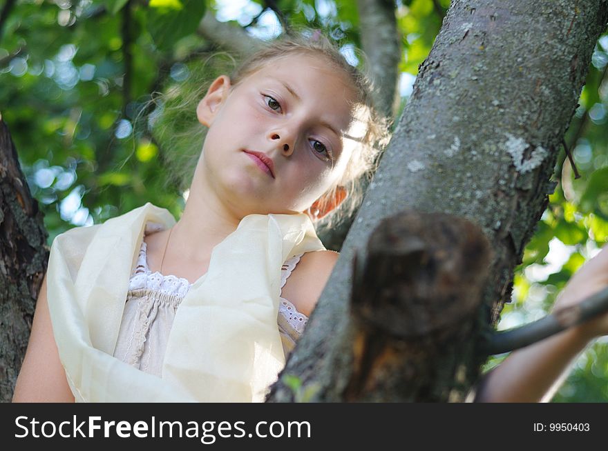 The cute girl among trees