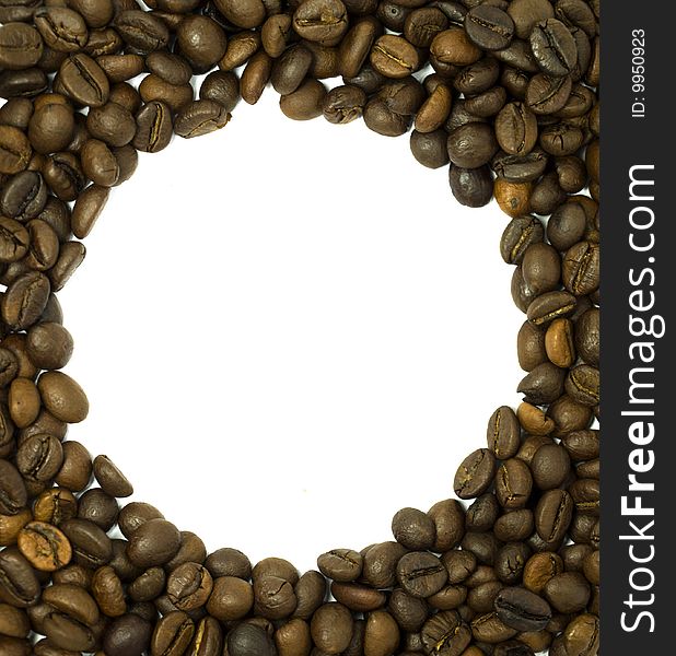 Round frame made of coffee beans white in the midle