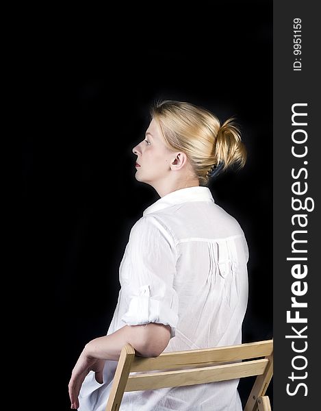 Studio portrait of a beautiful woman with blond hair