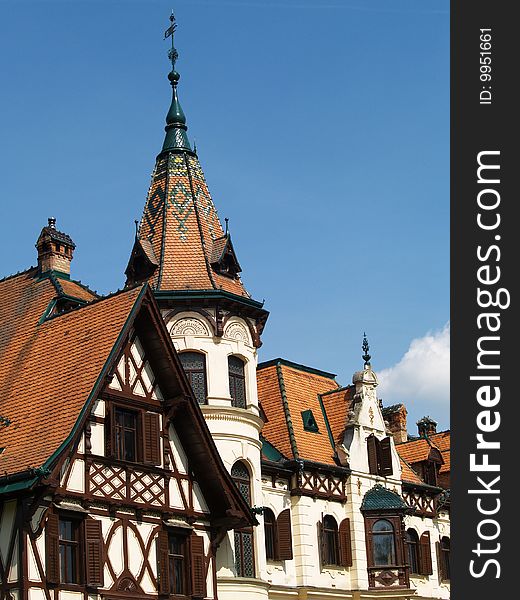 Detail of castle architecture with red roof