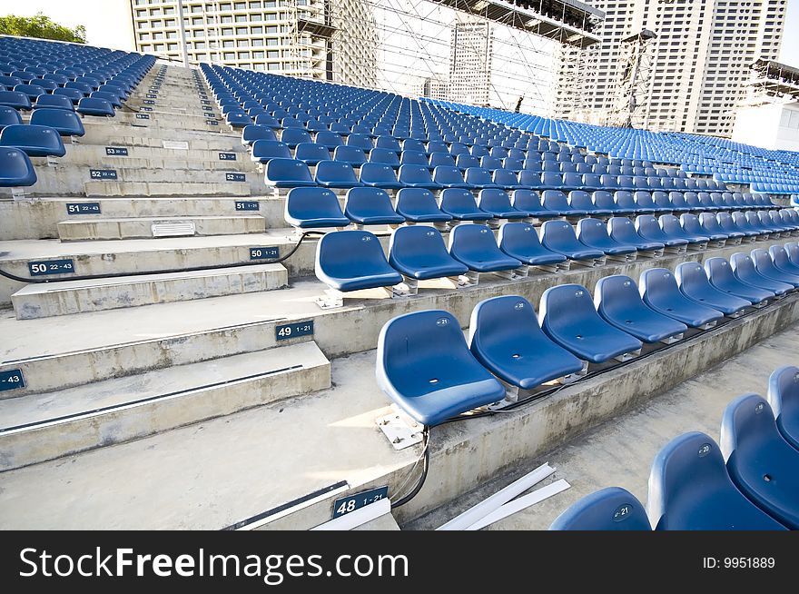 Blue sector seats in a stadium. Blue sector seats in a stadium.