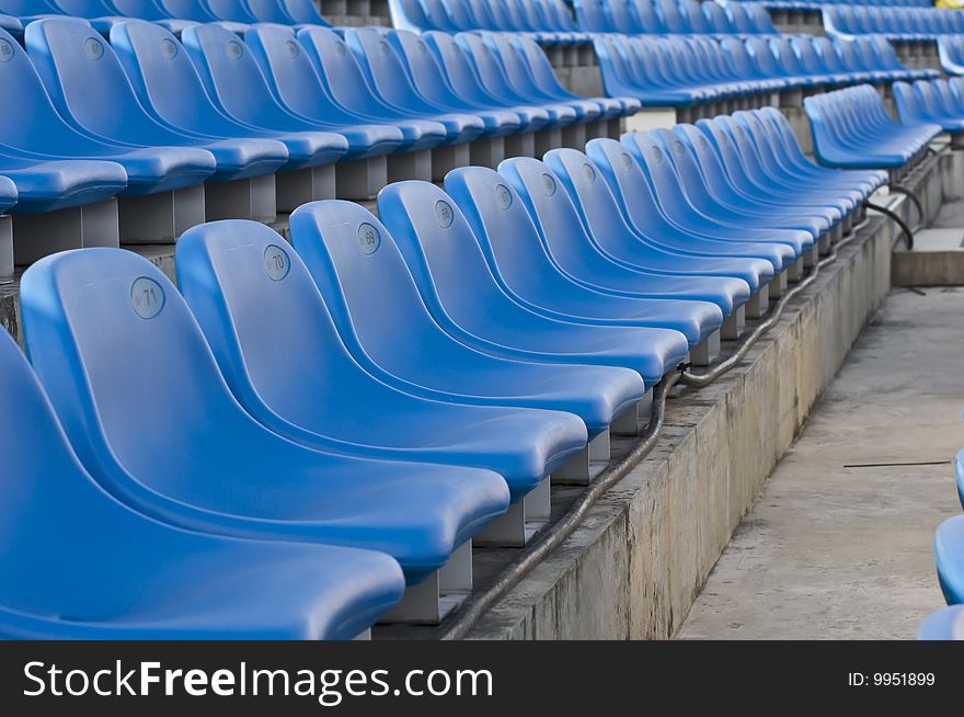 Seats in a local stadium in the blue sector. Seats in a local stadium in the blue sector.