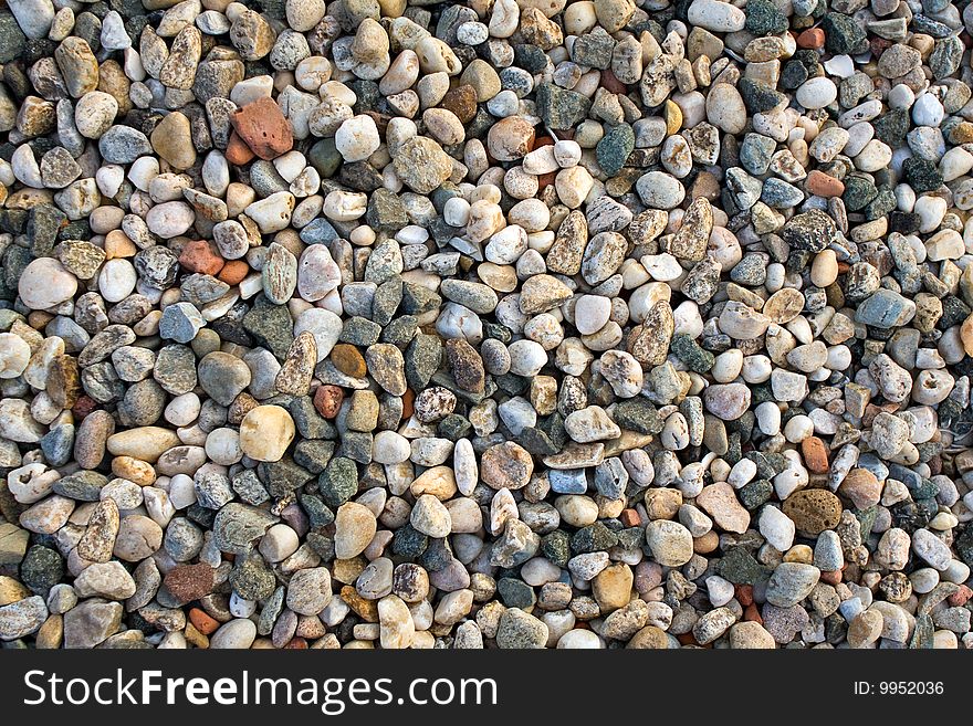 View of a huge pile of smooth pebbles.