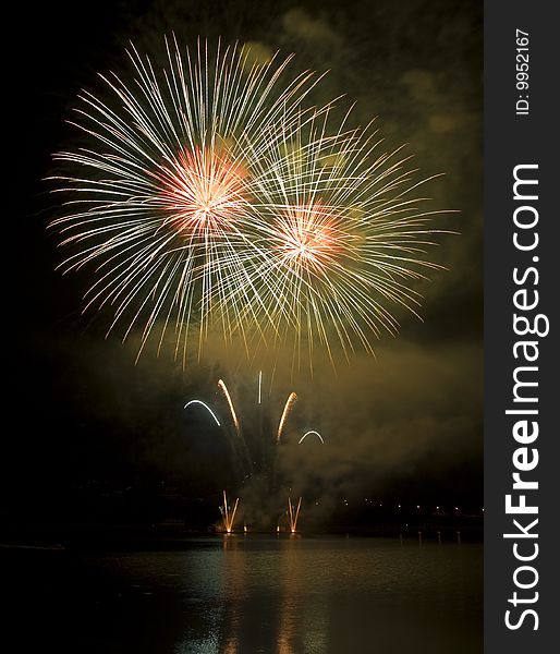 Fireworks with reflection on the lake