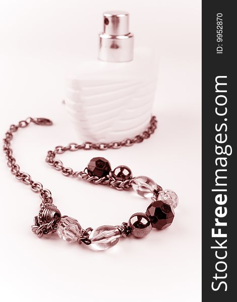 Necklace and parfume bottle