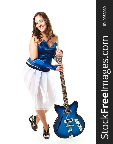 Sexy young brunette woman with a guitar against white background. Sexy young brunette woman with a guitar against white background