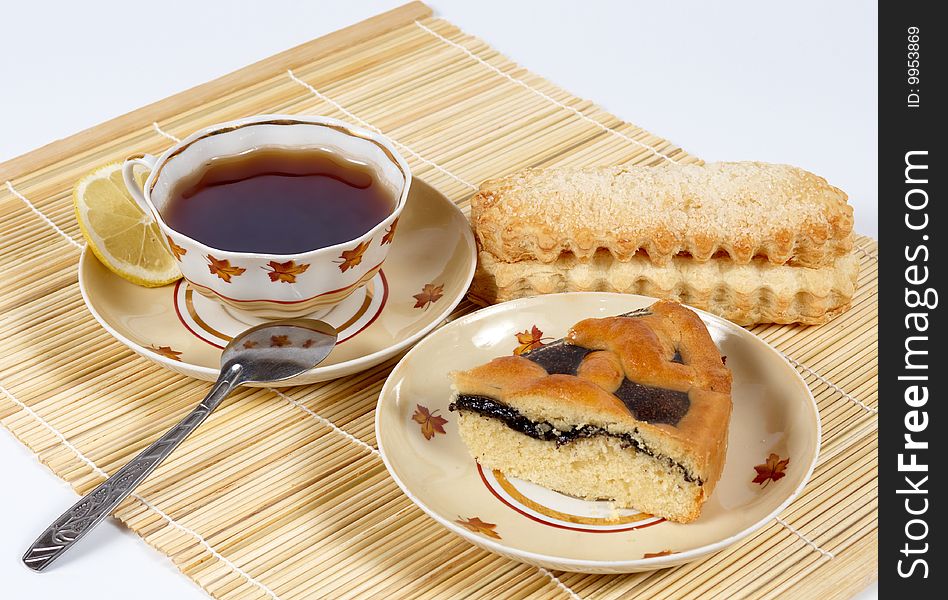 Tea With Lemon And Pastry.