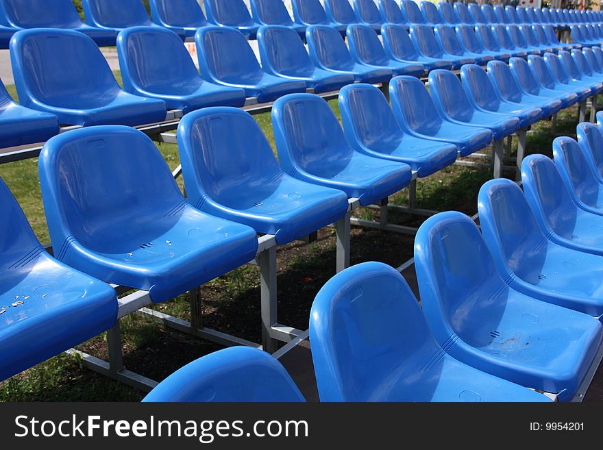 Blue Seats At The Football Stadium