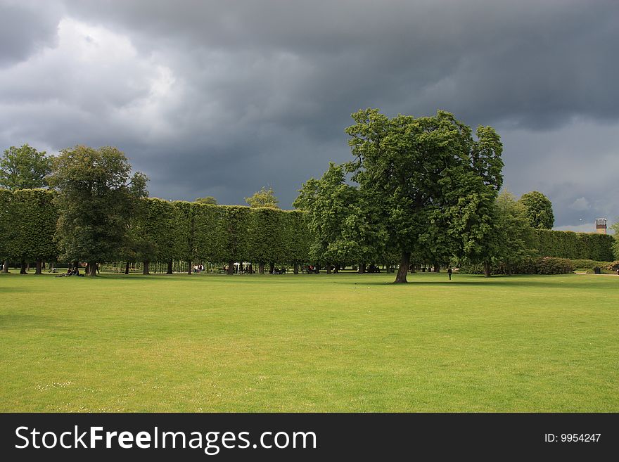 Green park and the stormy clouds. Green park and the stormy clouds