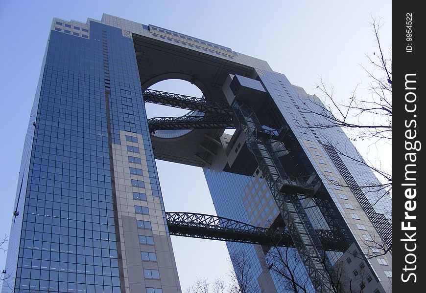 A connected modern twin glass building.