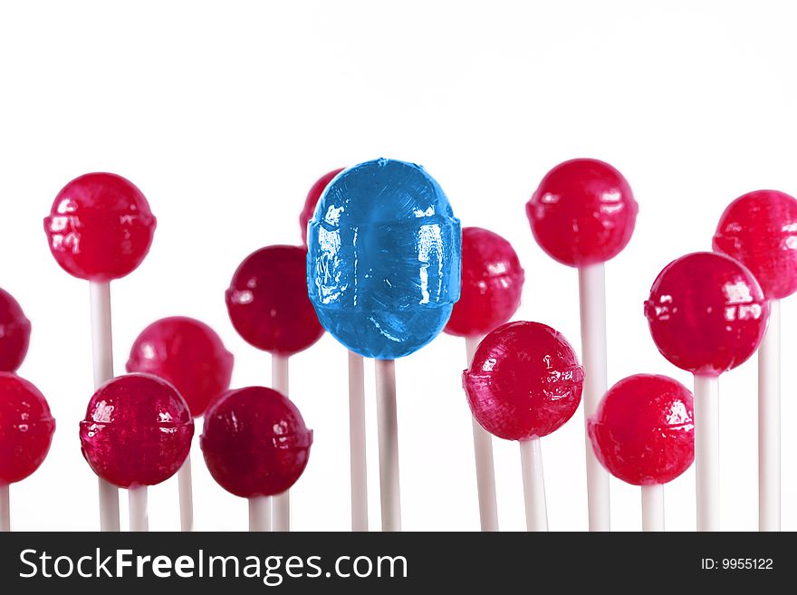 Blue and pink group of lollipops isolated. Blue and pink group of lollipops isolated