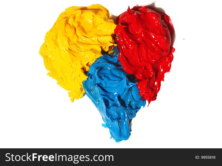 Primary colors oil paint making a heart isolated. Primary colors oil paint making a heart isolated