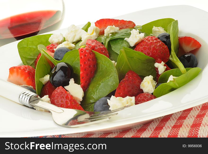 Fresh green salad with berries and feta. Fresh green salad with berries and feta.