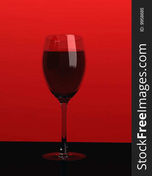 Red wine glass on a colour background