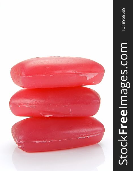 Bars of raspberry soap isolated against a white background