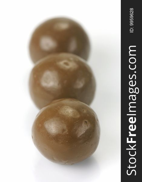 Chocolate balls isolated against a white background. Chocolate balls isolated against a white background