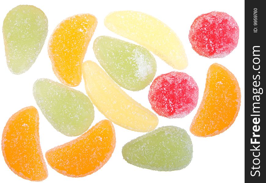 Colorful fruit candies isolated on white.