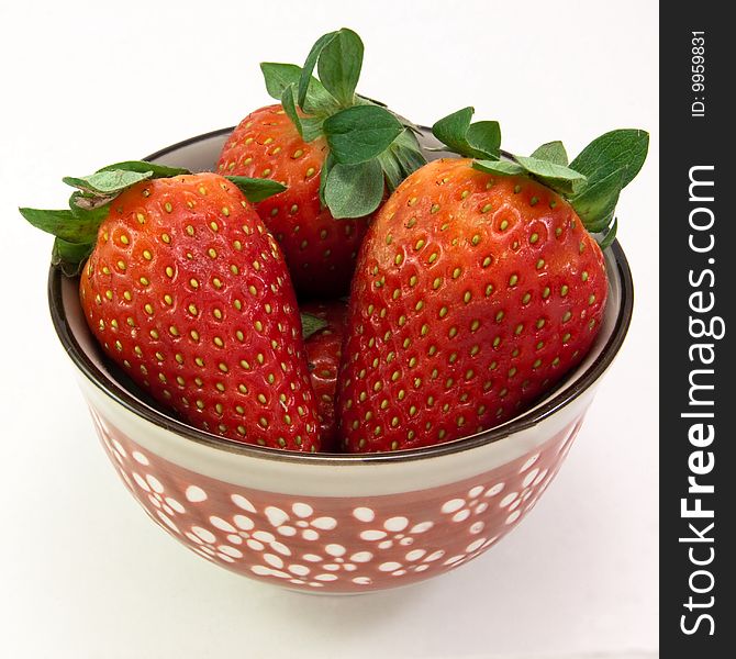 Small bowl of  fresh strawberries