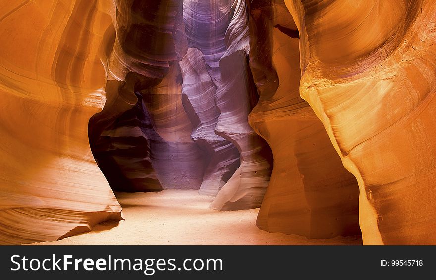 Lights and textures of walls in sandstone canyon.