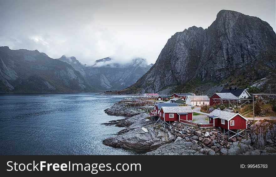 A tiny fjord village next to the water.
