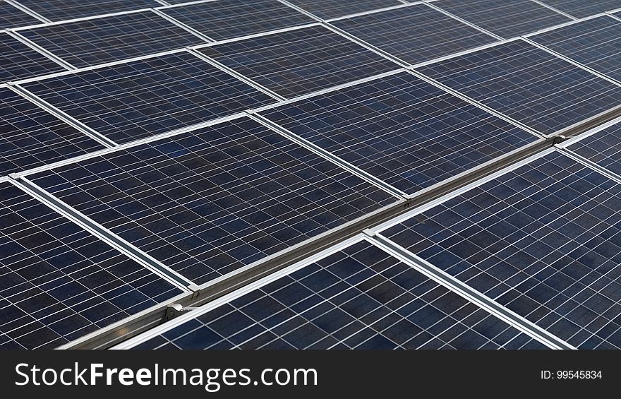 A close up of photovoltaic solar panel array. A close up of photovoltaic solar panel array.