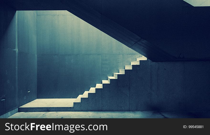 An urban concrete stairwell and stairs. An urban concrete stairwell and stairs.