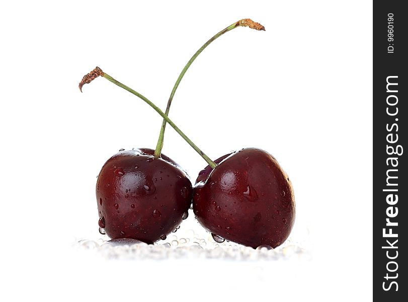 Cherry. Ripe berry with drops of water.