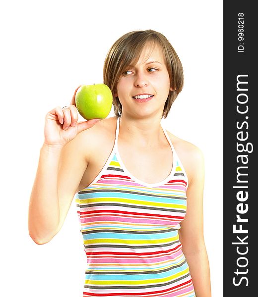 Portrait of a pretty Caucasian blond girl with a nice colorful striped dress who is smiling and she is holding a green apple in her hand. Isolated on white. Portrait of a pretty Caucasian blond girl with a nice colorful striped dress who is smiling and she is holding a green apple in her hand. Isolated on white.