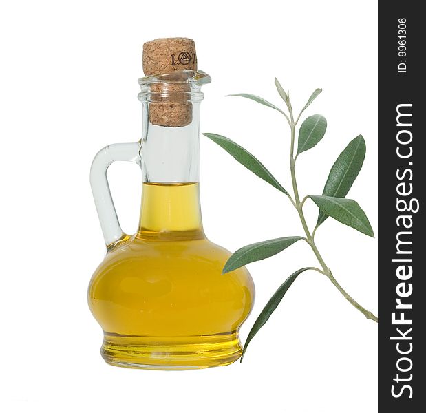 Bottle of olive oil and olive branch isolated on white background