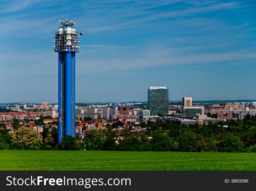 Water tower with antennas in Prague, Czech republic with antennas and a city skyline in the background. Water tower with antennas in Prague, Czech republic with antennas and a city skyline in the background