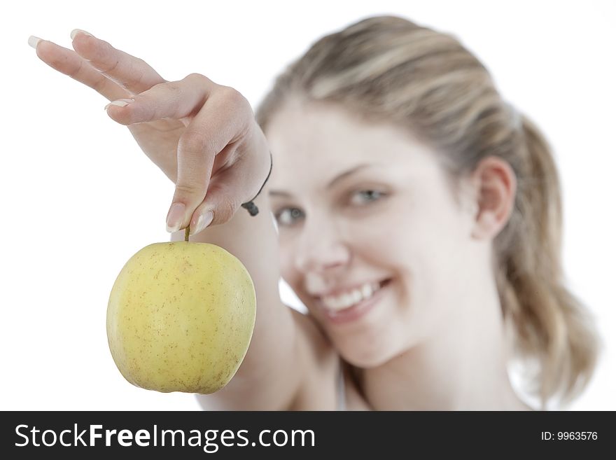 Beautiful young woman holding a  apple
